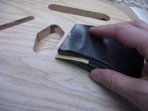 Sanding the sanding sealer