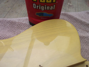Corner of guitar polished